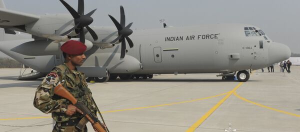 An Indian soldier stands guard in front of the first of the six C-130J Super Hercules, a US military aircraft manufactured by Lockheed Martin. (File) - Sputnik International