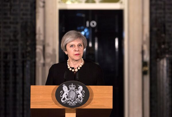Britain's Prime Minister Theresa May makes a statement at Downing street in London, Britain, March 22, 2017 following the attack in Westminster. Britain's Prime Minister Theresa May makes a statement at Downing street in London, Britain, March 22, 2017 following the attack in Westminster. - Sputnik International