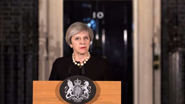Britain's Prime Minister Theresa May makes a statement at Downing street in London, Britain, March 22, 2017 following the attack in Westminster. - Sputnik International