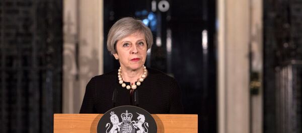 Britain's Prime Minister Theresa May makes a statement at Downing street in London, Britain, March 22, 2017 following the attack in Westminster. Britain's Prime Minister Theresa May makes a statement at Downing street in London, Britain, March 22, 2017 following the attack in Westminster. - Sputnik International