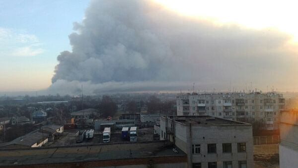 Smoke rises over a warehouse storing tank ammunition at a military base in the town of Balaklia (Balakleya), Kharkiv region, Ukraine - Sputnik International