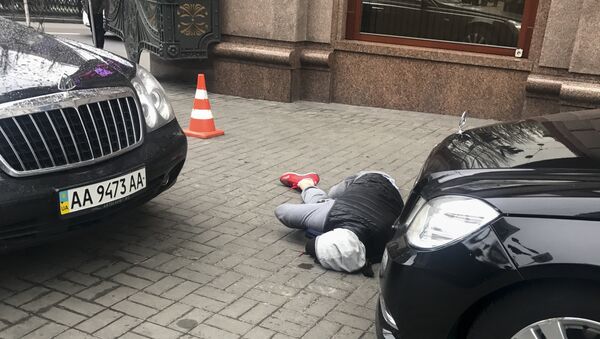 An assassin, who shot and killed Denis Voronenkov, lies wounded in Kiev, Ukraine - Sputnik International