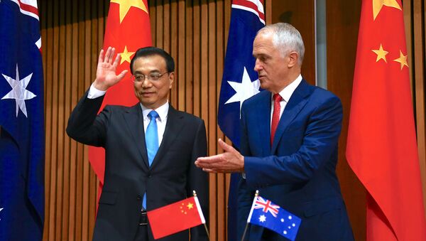 Australia's Prime Minister Malcolm Turnbull gestures to Chinese Premier Li Keqiang at the end of an official signing ceremony at Parliament House in Canberra, Australia, March 24, 2017 - Sputnik International