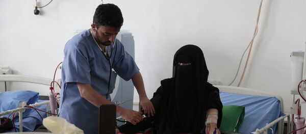 A doctor checks Aom Habeeb Hussen, 39, receiving dialysis treatment at the Kidney Center in the Republican Hospital in Sanaa, Yemen, Tuesday, July 26, 2016 A doctor checks Aom Habeeb Hussen, 39, receiving dialysis treatment at the Kidney Center in the Republican Hospital in Sanaa, Yemen, Tuesday, July 26, 2016 - Sputnik International