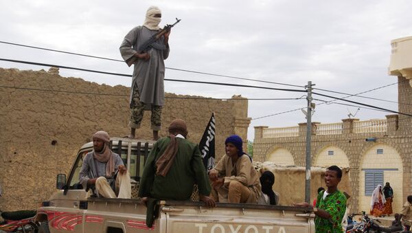 Fighters from the al-Qaida-linked Islamist group stand guard in Timbuktu, Mali (File) - Sputnik International