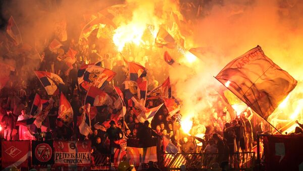 Russian and Serbian fans at the football match between FC Spartak Moscow and FC Crvena Zvezda in Belgrade - Sputnik International