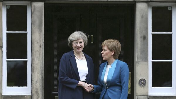 Scotland's First Minister Nicola Sturgeon greets Britain's new Prime Minister Theresa May as she arrives at Bute House in Edinburgh, July 15, 2016. - Sputnik International