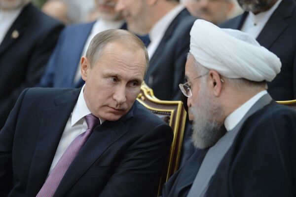 Russian President Vladimir Putin, left, and President of Iran Hassan Rouhani during the joint documents signing ceremony following the Russian-Iranian talks in Tehran, Iran, November 23, 2015 Russian President Vladimir Putin, left, and President of Iran Hassan Rouhani during the joint documents signing ceremony following the Russian-Iranian talks in Tehran, Iran, November 23, 2015 - Sputnik International