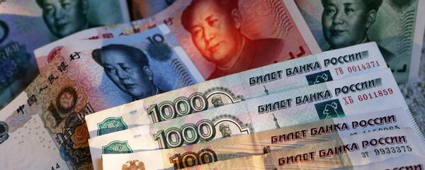 Rubles and yuans Rubles and yuans - Sputnik International