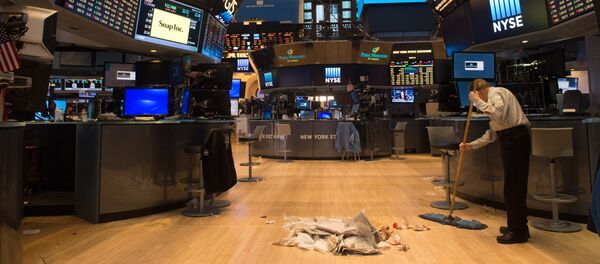 A worker sweeps the floor after the closing bell of the Dow Jones at the New York Stock Exchange, March 24, 2017 in New York A worker sweeps the floor after the closing bell of the Dow Jones at the New York Stock Exchange, March 24, 2017 in New York - Sputnik International