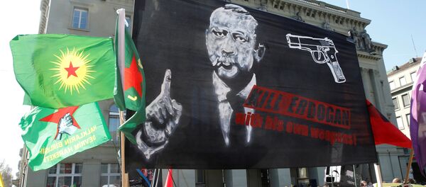People hold banners and flags during a demonstration against Erdogan dictatorship and in favour of democracy in Turkey, in Bern, Switzerland March 25, 2017 - Sputnik International