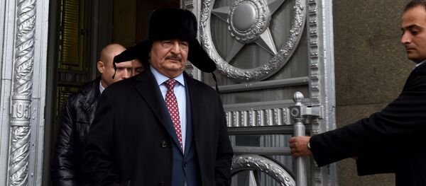 Marshal Khalifa Haftar, chief of the Libyan National Army, leaves the main building of Russia's Foreign Ministry after a meeting with Russian Minister of Foreign Affairs in Moscow on November 29, 2016 - Sputnik International