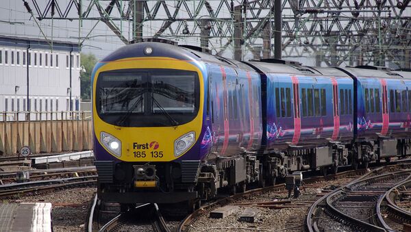 First TransPennine Express Desiro/Pennine DMU 185135 arrives at Manchester Piccadilly with a North Transpennine service to Manchester Airport - Sputnik International