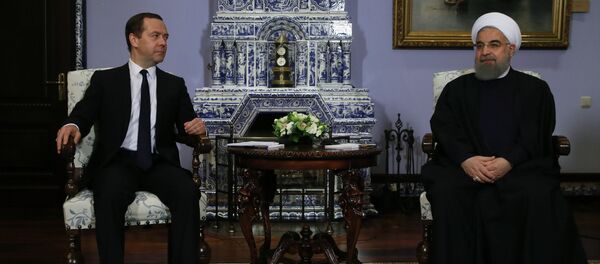 March 27, 2017. Russian Prime Minister Dmitry Medvedev meets with President of Iran Hassan Rouhani, right, on his official visit to Russia March 27, 2017. Russian Prime Minister Dmitry Medvedev meets with President of Iran Hassan Rouhani, right, on his official visit to Russia - Sputnik International