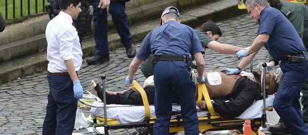 FILE- In this March 22, 2017 file photo, the attacker Khalid Masood is treated by emergency services outside the Houses of Parliament London. British Police named on Thursday March 23, 2017, Khalid Masood as The Houses of Parliament attacker FILE- In this March 22, 2017 file photo, the attacker Khalid Masood is treated by emergency services outside the Houses of Parliament London. British Police named on Thursday March 23, 2017, Khalid Masood as The Houses of Parliament attacker - Sputnik International