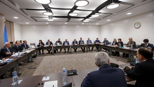 Deputy UN Special Envoy for Syria Ramzy Ezzeldin Ramzy and Syria's main opposition High Negotiations Committee (HNC) leader Nasr al-Hariri attend a round of negotiation during the Intra Syria talks at the European headquarters of the United Nations in Geneva, Switzerland, Monday, March 27, 2017 - Sputnik International