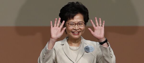 Former Hong Kong Chief Secretary Carrie Lam waves as she declares her victory in the chief executive election of Hong Kong in Hong Kong Former Hong Kong Chief Secretary Carrie Lam waves as she declares her victory in the chief executive election of Hong Kong in Hong Kong - Sputnik International
