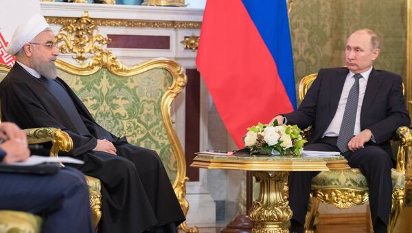 March 28, 2017. Russian President Vladimir Putin and President of the Islamic Republic of Iran Hassan Rouhani, left, during a meeting. - Sputnik International