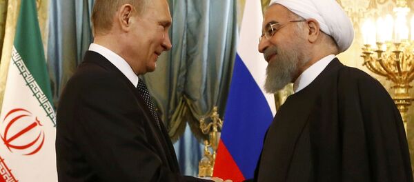 Russian President Vladimir Putin shakes hands with Iranian President Hassan Rouhani during their meeting at the Kremlin in Moscow, Russia March 28, 2017. Russian President Vladimir Putin shakes hands with Iranian President Hassan Rouhani during their meeting at the Kremlin in Moscow, Russia March 28, 2017. - Sputnik International