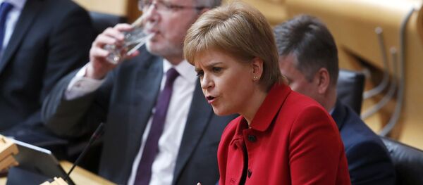 Scotland's First Minister Nicola Sturgeon speaks in the chamber on the second day of the 'Scotland's Choice' debate on a motion to seek the authority to hold an indpendence referendum, at the Scottish Parliament in Edinburgh - Sputnik International