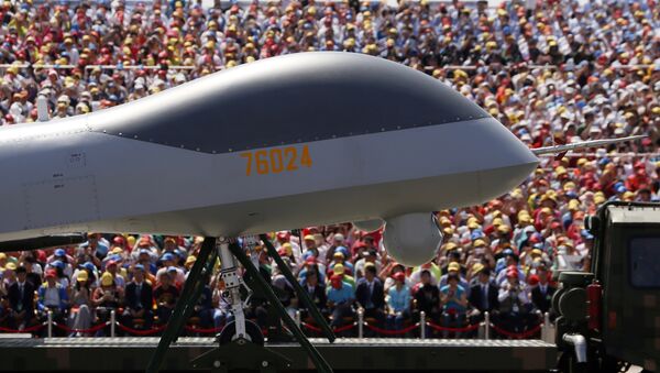 FILE - In this file photo taken Thursday, Sept. 3, 2015, the front of the Wing Loong, a Chinese made medium-altitude long-endurance unmanned aerial vehicle, moves past spectators during a parade commemorating the 70th anniversary of Japan's surrender during World War II held in Beijing. - Sputnik International
