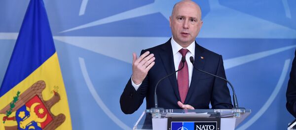 Moldova's Prime Minister Pavel Filip gives a joint statement with NATO Secretary General Jens Stoltenberg after a meeting at NATO Headquarters in Brussels, Belgium March 30, 2017. Moldova's Prime Minister Pavel Filip gives a joint statement with NATO Secretary General Jens Stoltenberg after a meeting at NATO Headquarters in Brussels, Belgium March 30, 2017. - Sputnik International