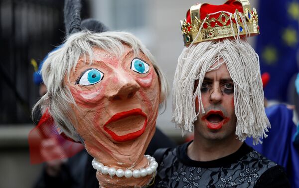 A protester holds an effigy of Britain's Prime Minister Theresa May during an anti-Brexit demonstration after Britain's Prime Minister Theresa May triggered the process by which the United Kingdom will leave the European Union, in London, Britain March 29, 2017. - Sputnik International