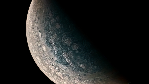 This Jupiter photo is courtesy of Juno, and clearly shows monstrous swirling storms on the planet's surface. - Sputnik International