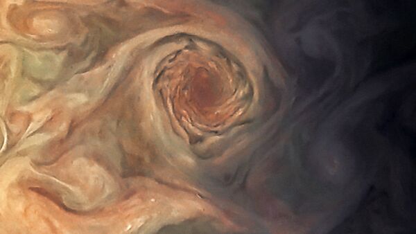 This Juno photo of Jupiter isn't the Red Spot, but rather the white pearl storms on Jupiter, just southwest of the White Oval. - Sputnik International