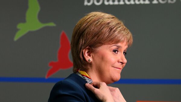 Scotland's First Minister Nicola Sturgeon smiles as she visits Genpact, an Indian multinational company, where she announced new jobs for Scotland Wednesday March 29, 2017. - Sputnik International