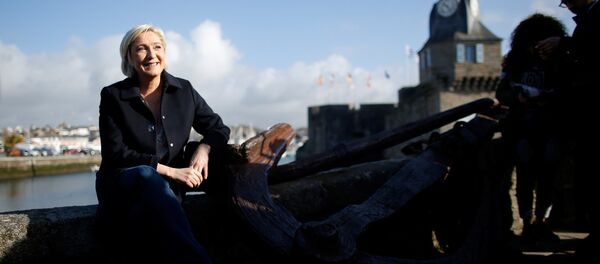 Marine Le Pen, French National Front (FN) political party leader and candidate for French 2017 presidential election pauses during a visit to a market in Concarneau, France, March 31, 2017 Marine Le Pen, French National Front (FN) political party leader and candidate for French 2017 presidential election pauses during a visit to a market in Concarneau, France, March 31, 2017 - Sputnik International