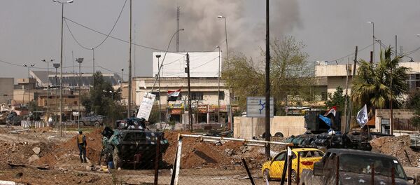 Smoke rises from the old city during a battle against Islamic State militants, in Mosul, Iraq, March 29, 2017 Smoke rises from the old city during a battle against Islamic State militants, in Mosul, Iraq, March 29, 2017 - Sputnik International