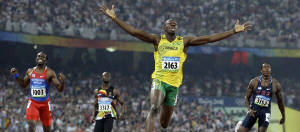 FILE - In this Aug. 20, 2008 file photo, Jamaica's Usain Bolt crosses the finish line to win the gold in the men's 200-meter final during the athletics competitions in the National Stadium at the Beijing 2008 Olympics in Beijing FILE - In this Aug. 20, 2008 file photo, Jamaica's Usain Bolt crosses the finish line to win the gold in the men's 200-meter final during the athletics competitions in the National Stadium at the Beijing 2008 Olympics in Beijing - Sputnik International