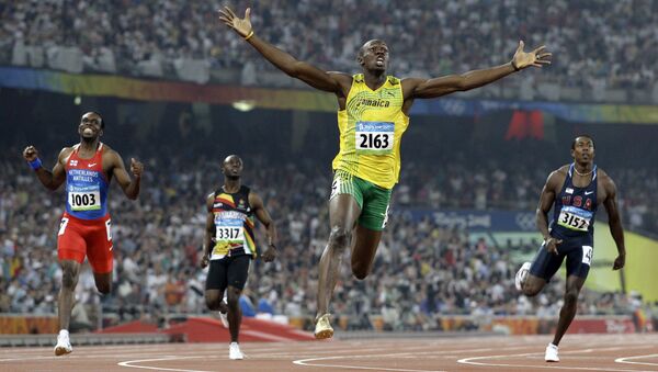 FILE - In this Aug. 20, 2008 file photo, Jamaica's Usain Bolt crosses the finish line to win the gold in the men's 200-meter final during the athletics competitions in the National Stadium at the Beijing 2008 Olympics in Beijing - Sputnik International