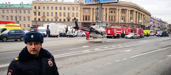 Emergency vehicles and a helicopter are seen at the entrance to Technological Institute metro station in Saint Petersburg on April 3, 2017 Emergency vehicles and a helicopter are seen at the entrance to Technological Institute metro station in Saint Petersburg on April 3, 2017 - Sputnik International