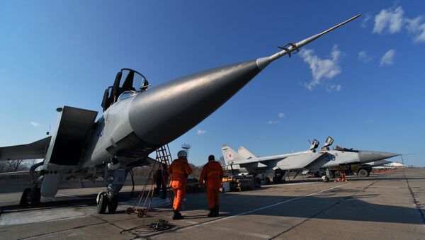 The pre-flight preparation of the Mikoyan MIG-31, a supersonic all-weather long-range interceptor jet, before an exercize of a MIG-31 flight, which is part of the aviation regiment of the Pacific Fleet's Kamchatka air base in Prymorye Territory - Sputnik International