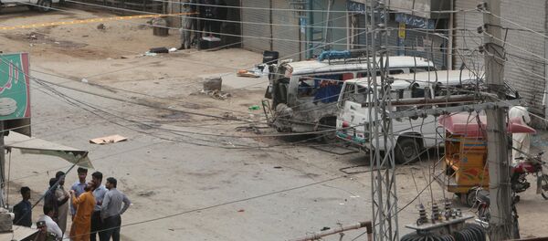 Security officials gather near the site of an explosion, near vehicles taking part in census, in Lahore, Pakistan, April 5, 2017. Security officials gather near the site of an explosion, near vehicles taking part in census, in Lahore, Pakistan, April 5, 2017. - Sputnik International