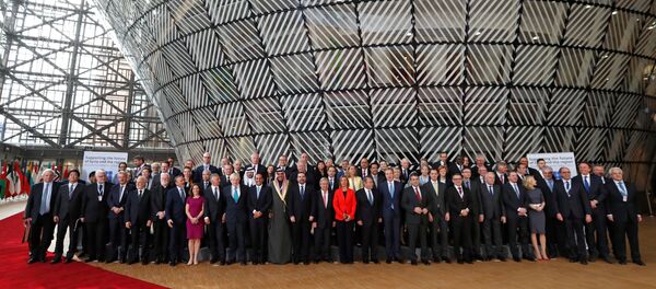 Foreign Ministers and officials pose for a group photo as they take part in an international conference on the future of Syria and the region, in Brussels, Belgium, April 5, 2017. - Sputnik International
