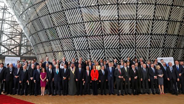Foreign Ministers and officials pose for a group photo as they take part in an international conference on the future of Syria and the region, in Brussels, Belgium, April 5, 2017. - Sputnik International