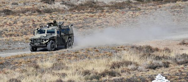 A Tigr armored SUV takes part in the Rubezh/Frontier-2016 tactical exercise involving military units of Collective Rapid-Deployment Forces from countries, members of the Collective Security Treaty Organization (CSTO). (File) A Tigr armored SUV takes part in the Rubezh/Frontier-2016 tactical exercise involving military units of Collective Rapid-Deployment Forces from countries, members of the Collective Security Treaty Organization (CSTO). (File) - Sputnik International