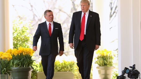 President Donald Trump and Jordan's King Abdullah II walk to their news conference in the Rose Garden at the White House in Washington, Wednesday, April 5, 2017 - Sputnik International
