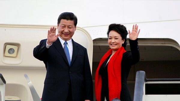 Chinese President Xi Jinping (L) and First Lady Peng Liyuan. (File) - Sputnik International