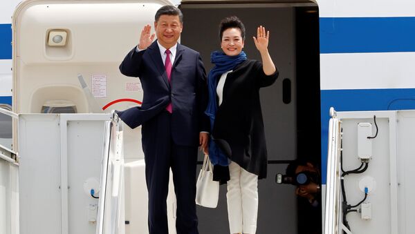 China's President Xi Jinping and his wife Peng Liyuan arrive at Palm Beach International Airport in West Palm Beach, Florida, U.S - Sputnik International