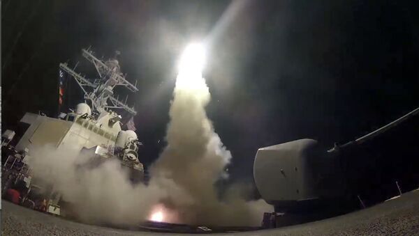 In this image from video provided by the U.S. Navy, the guided-missile destroyer USS Porter (DDG 78) launches a tomahawk land attack missile in the Mediterranean Sea, Friday, April 7, 2017. - Sputnik International