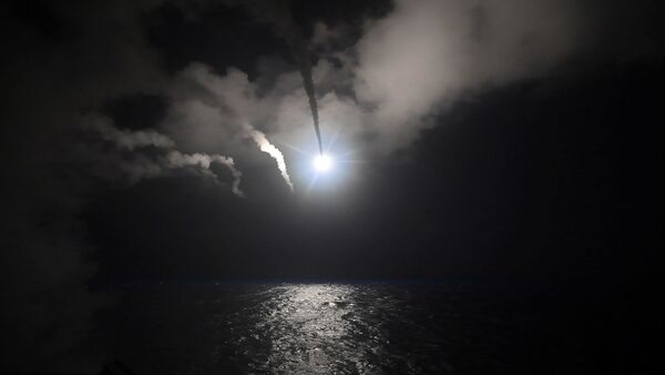 In this image provided by the U.S. Navy, the guided-missile destroyer USS Porter (DDG 78) launches a tomahawk land attack missile in the Mediterranean Sea, Friday, April 7, 2017. - Sputnik International