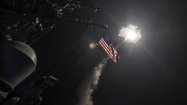 In this image provided by the U.S. Navy, the guided-missile destroyer USS Porter (DDG 78) launches a tomahawk land attack missile in the Mediterranean Sea, Friday, April 7, 2017. - Sputnik International