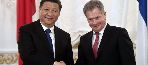 China's President Xi Jinping and Finland's President Sauli Niinisto shake hands during the signing ceremony at the Presidential Palace in Helsinki, Finland April 5, 2017. - Sputnik International