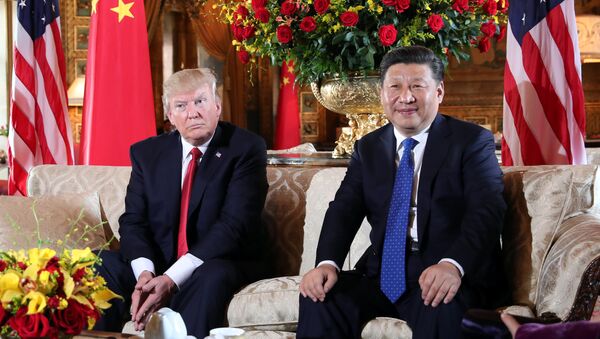 U.S. President Donald Trump welcomes Chinese President Xi Jinping at Mar-a-Lago state in Palm Beach, Florida, U.S., April 6, 2017. - Sputnik International