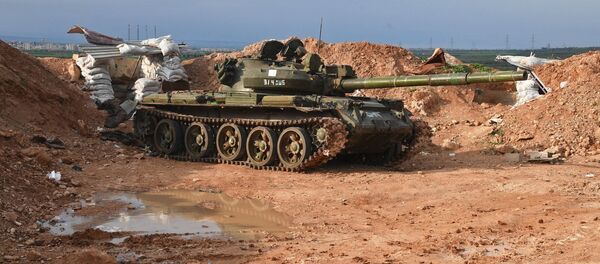 A tank at the Syrian Army's position to the north of Hama A tank at the Syrian Army's position to the north of Hama - Sputnik International