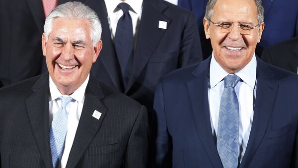 The Russian foreign minister Sergey Lavrov, right, and US Secretary of State Rex Tillerson stand together during the G-20 Foreign Ministers meeting in Bonn, Germany - Sputnik International